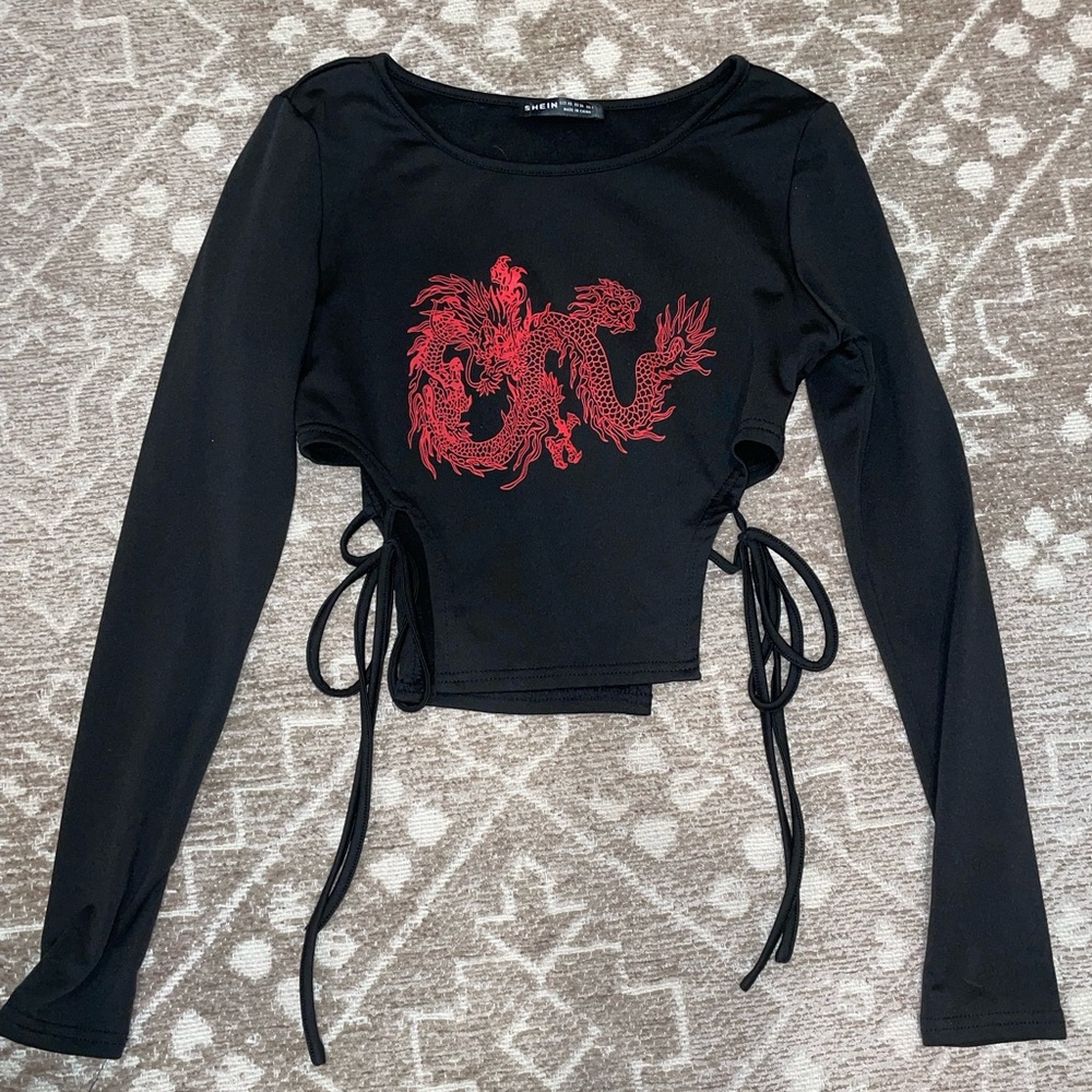 Black crop top with cut out design on sides
